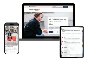 Mockup einer hellen Website mit roten und dunkelblauen Akzenten auf Laptop, Smartphone und Tablet